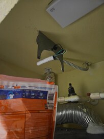 Electrical wiring above dryer