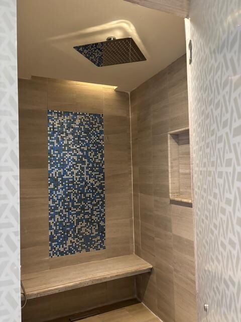 Large shower with body wash, shampoo and conditioner 