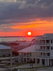 One of the many sunsets we saw looking over the Bay from our patio