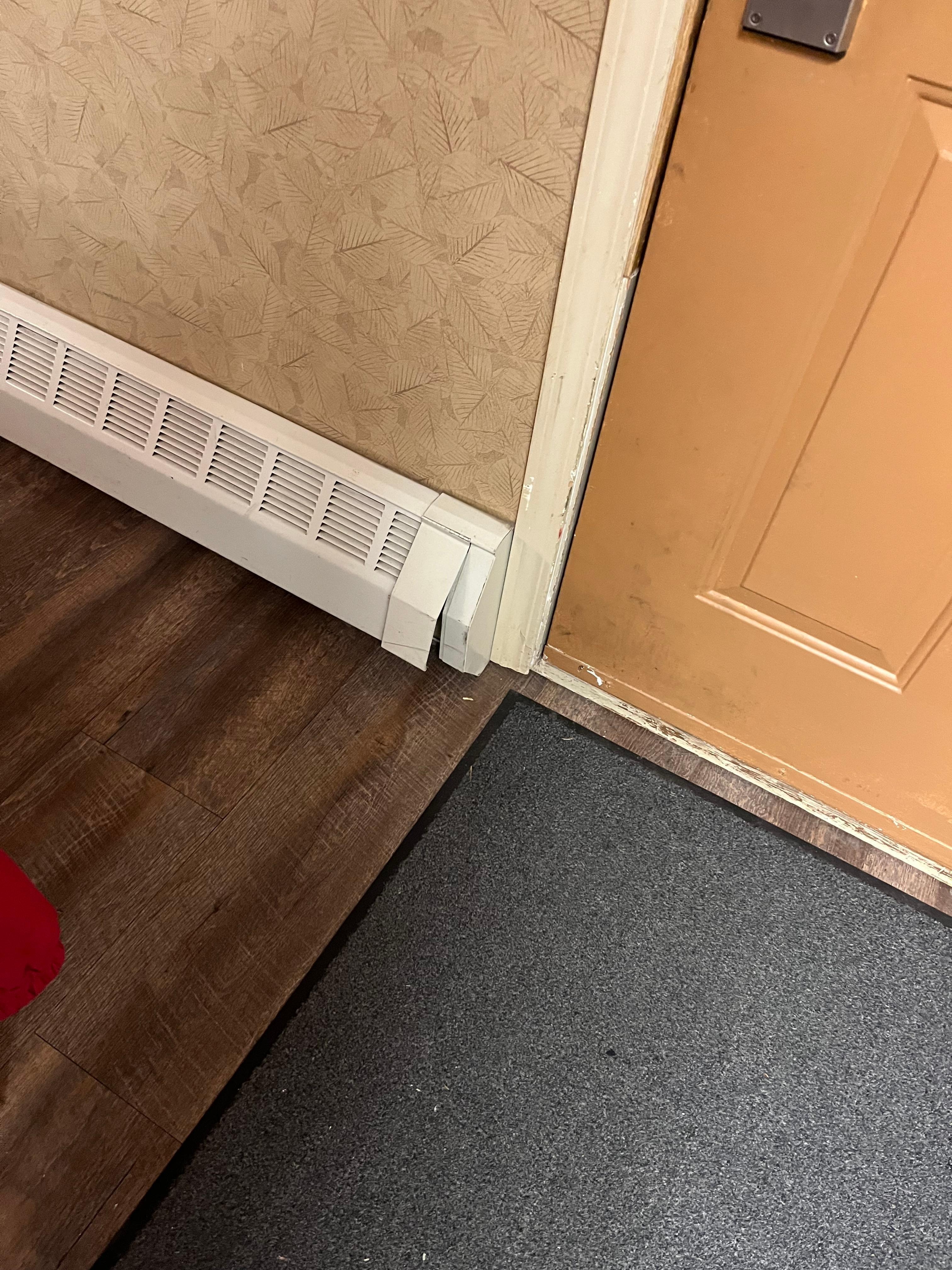 The main door is worn and not properly maintained