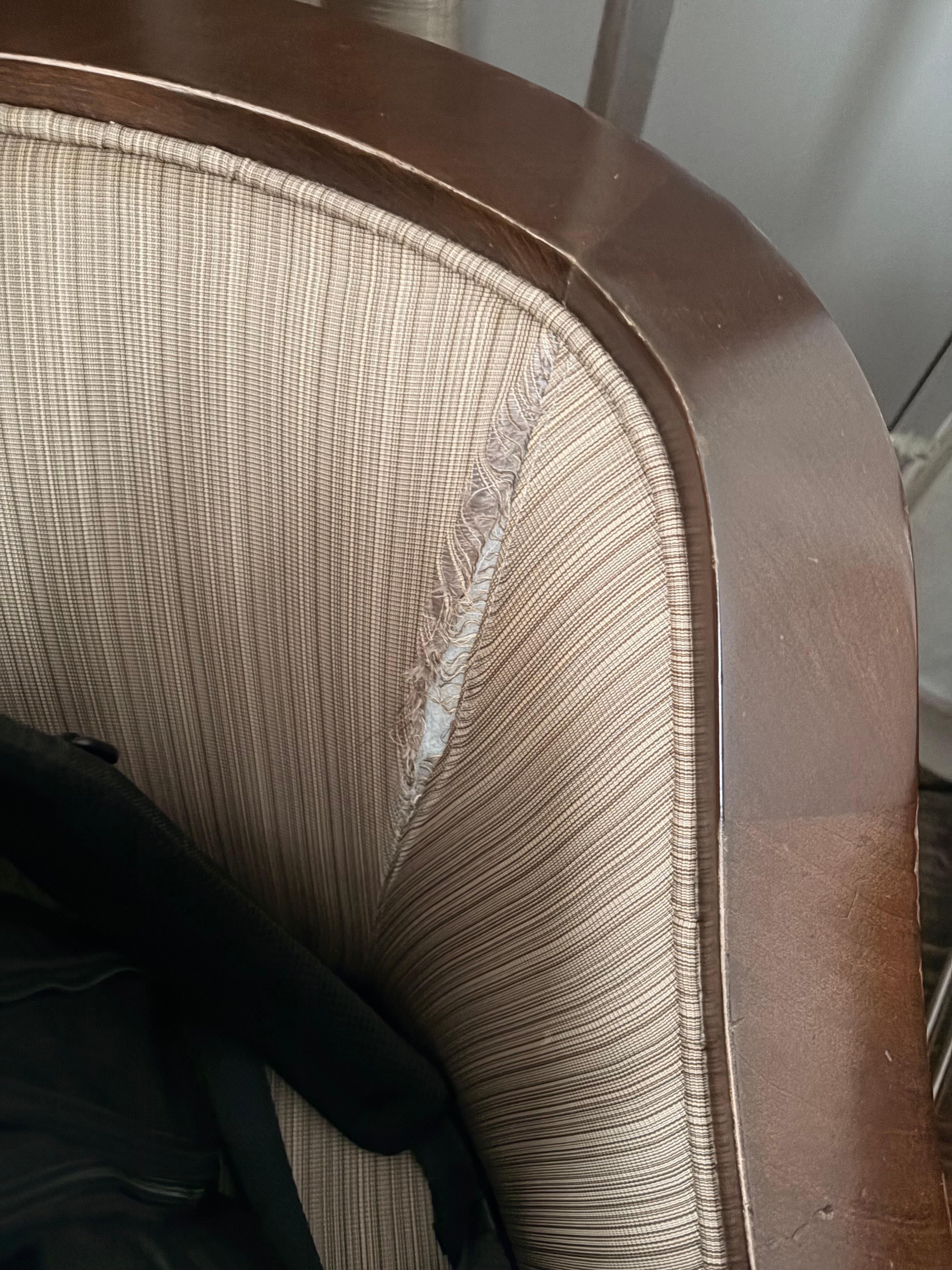 Room chair , dirty and torn chair