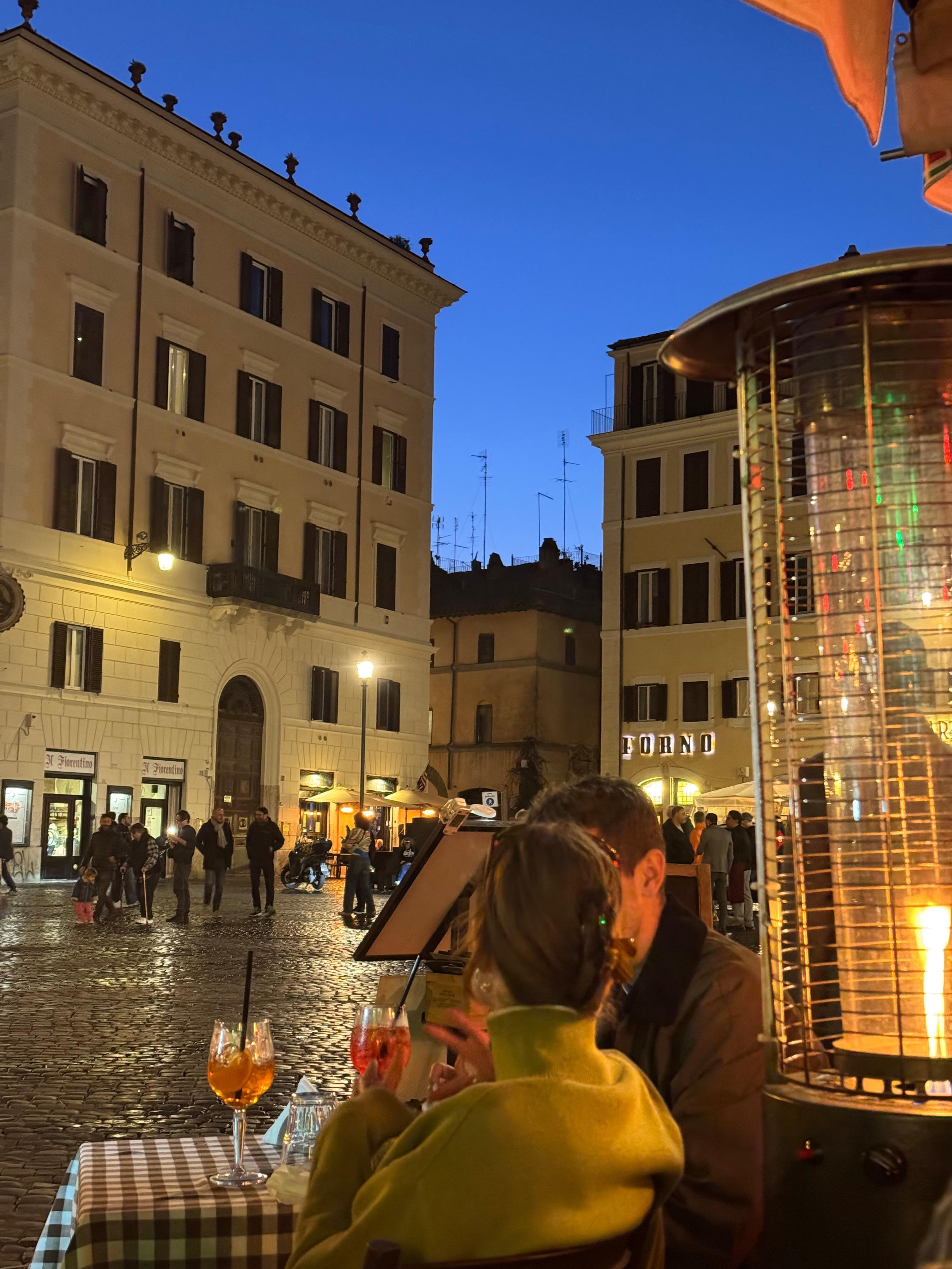 The shorter building in the corner/top floor is the apartment