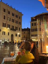 The shorter building in the corner/top floor is the apartment