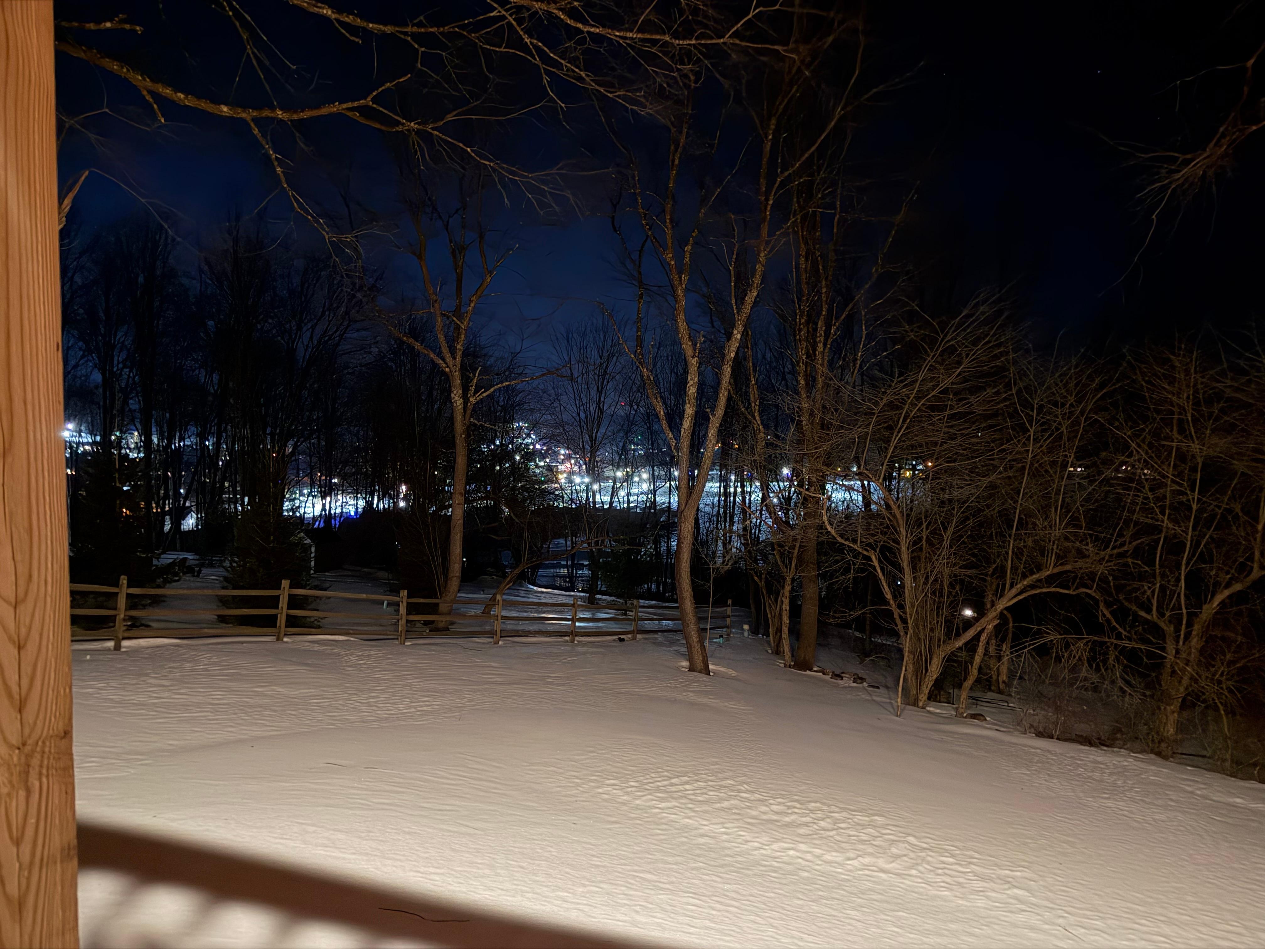 Wisp Resort and ski slopes illuminated in the distance
