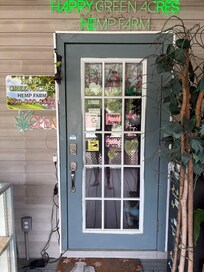 front door to the store right next to the entry to the bathroom (separate from the room)