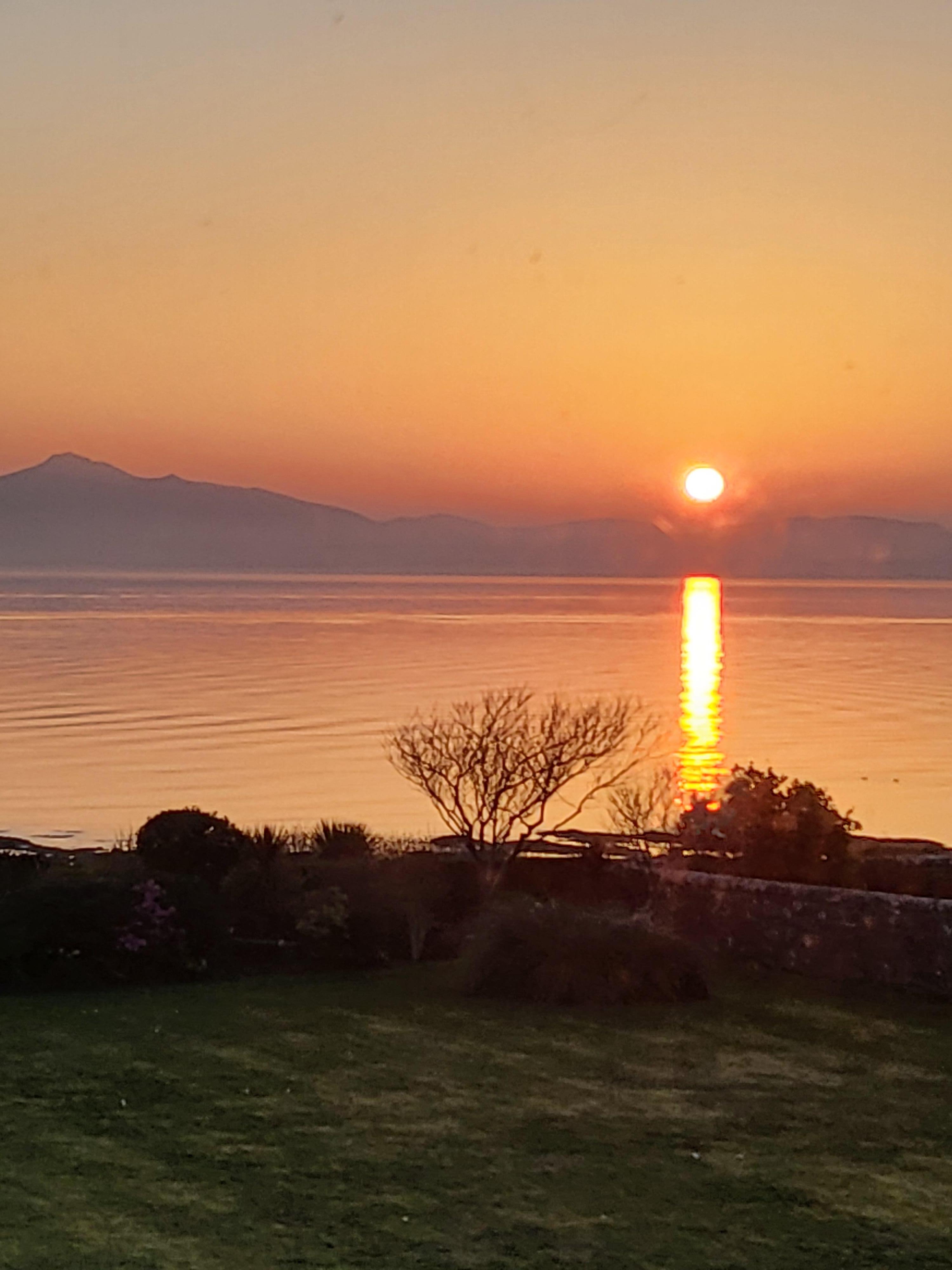 View from our bedroom, walk out garden onto the beach 