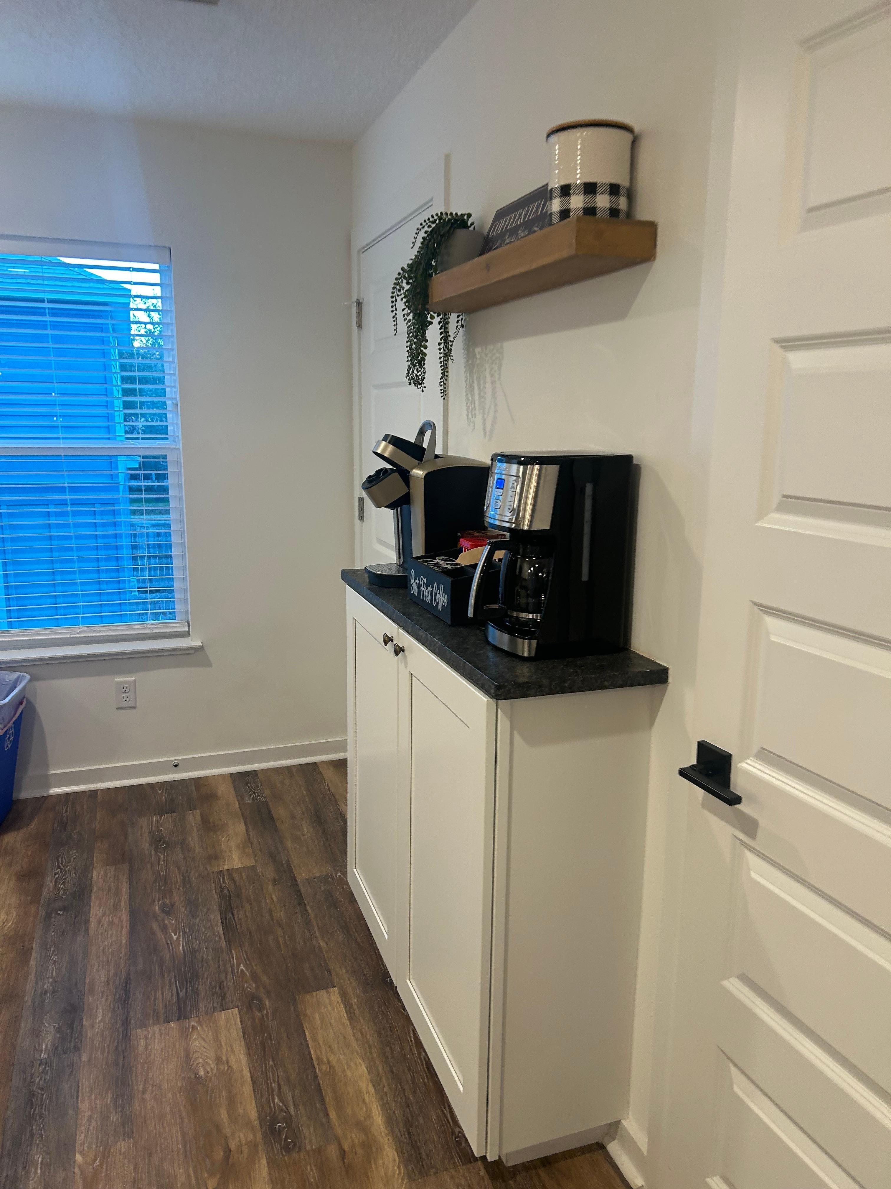 A room downstairs next to patio. Huge closet and bathroom with large shower. King size bed. 