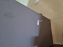 Painting scraped off wall