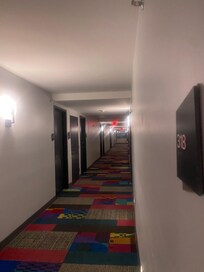 a view of the hallway on the third floor