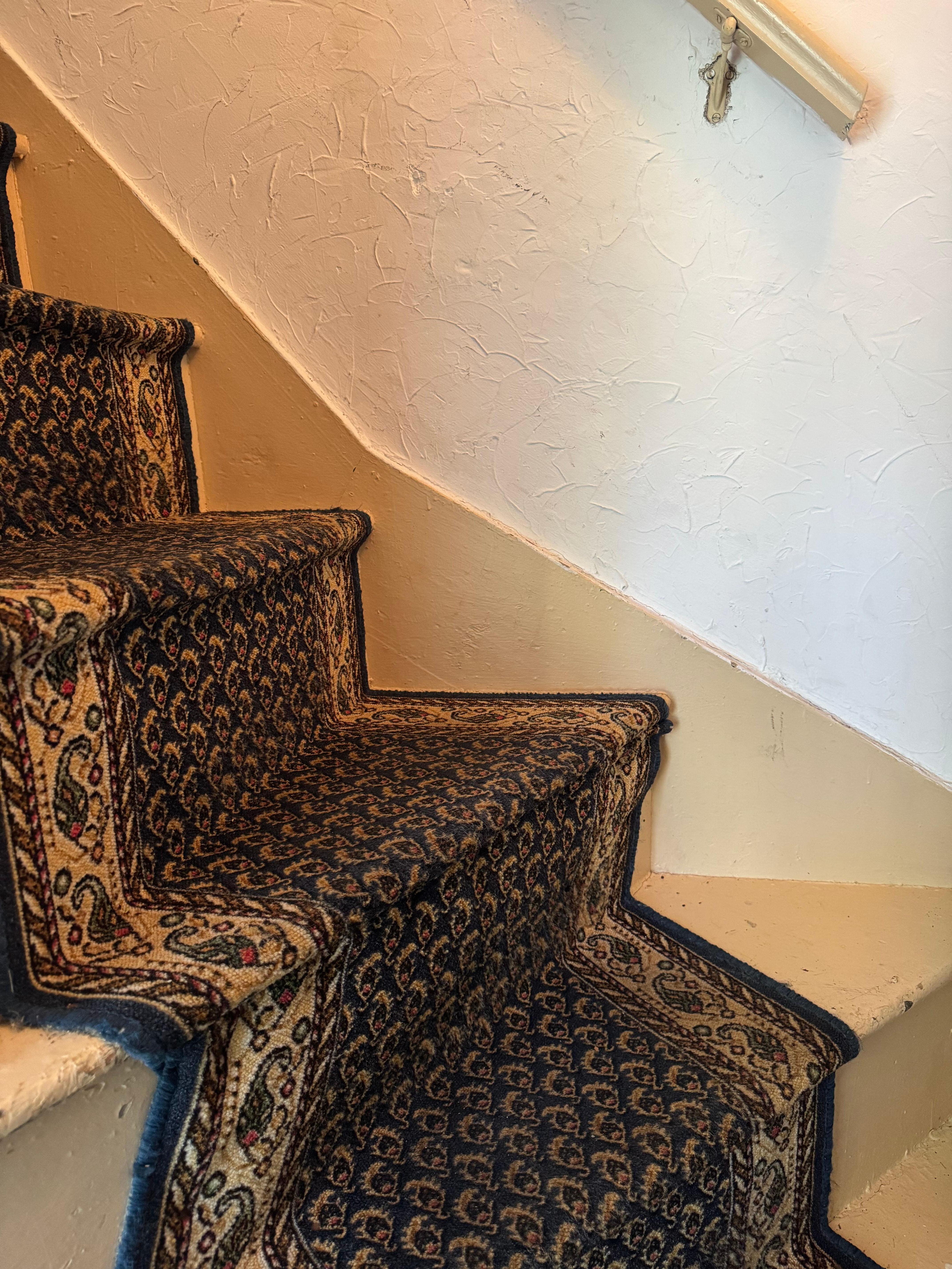 When you open the front door to enter this is the view of the stairs.