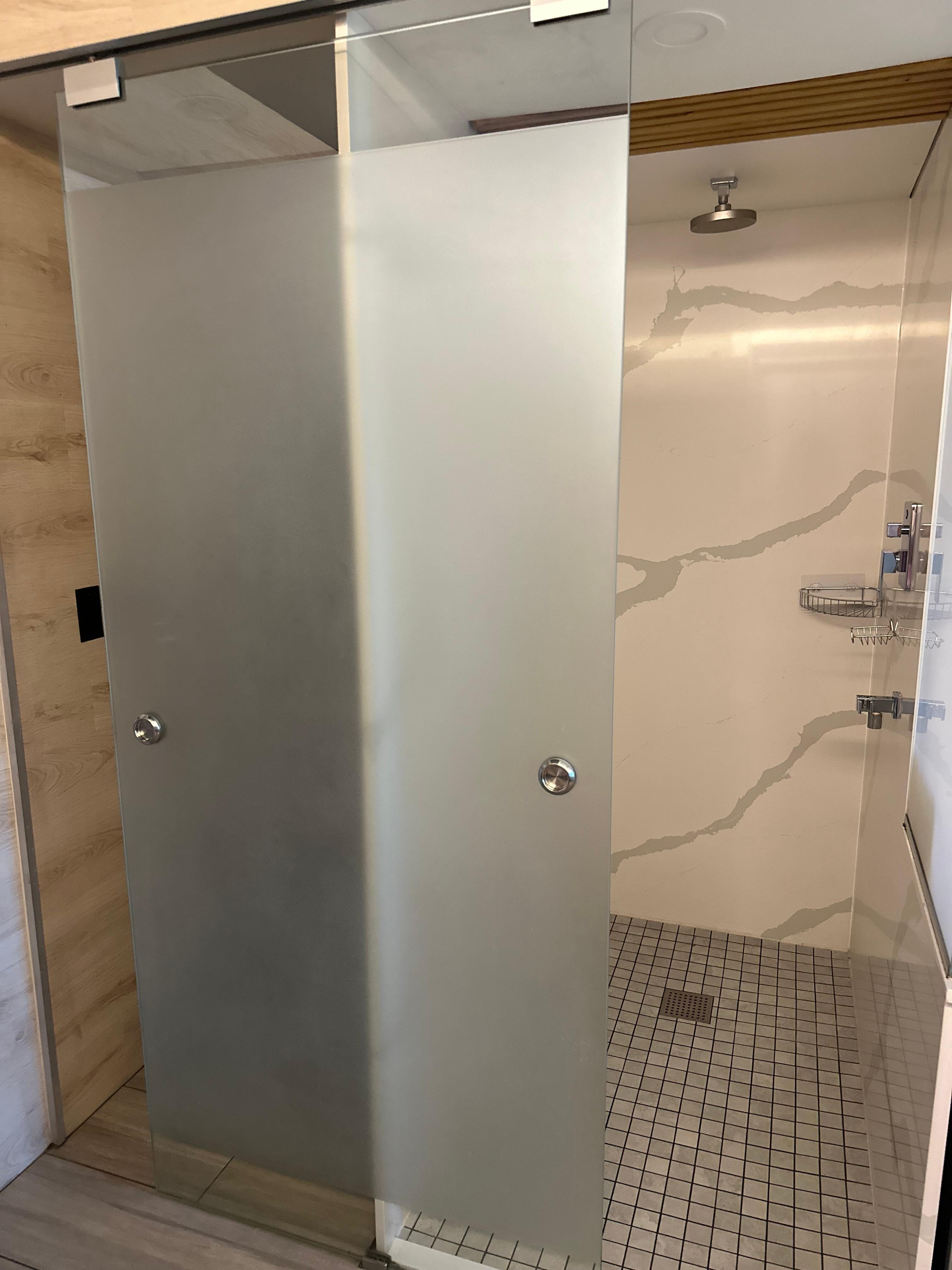 King guest room - toilet/shower combo stalls 