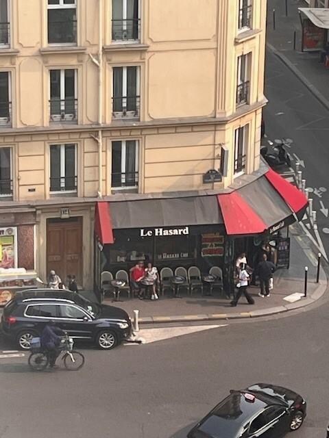 My son took this picture of us at the bar on the corner from the balcony.