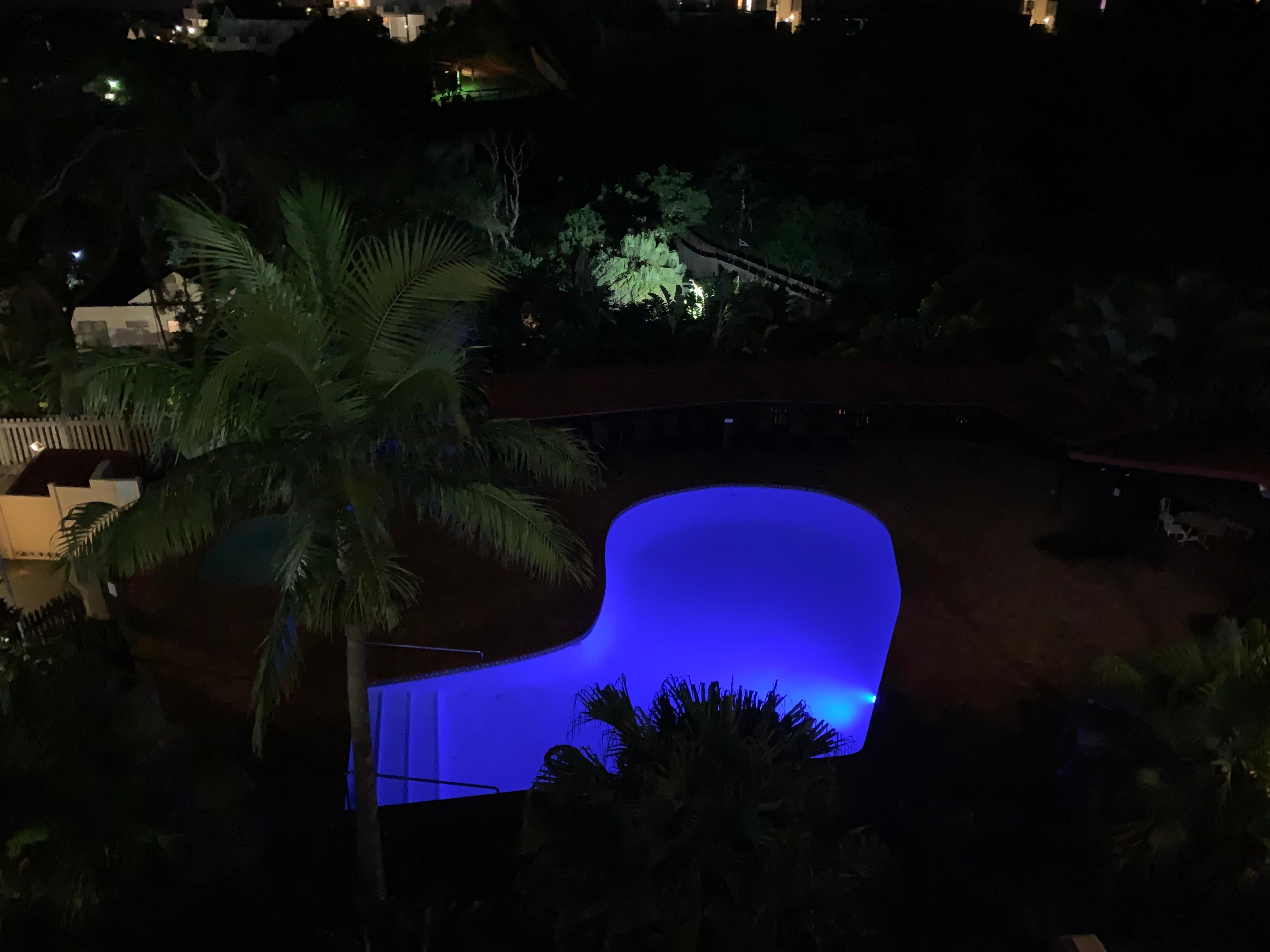 The view of the swimming pool at night