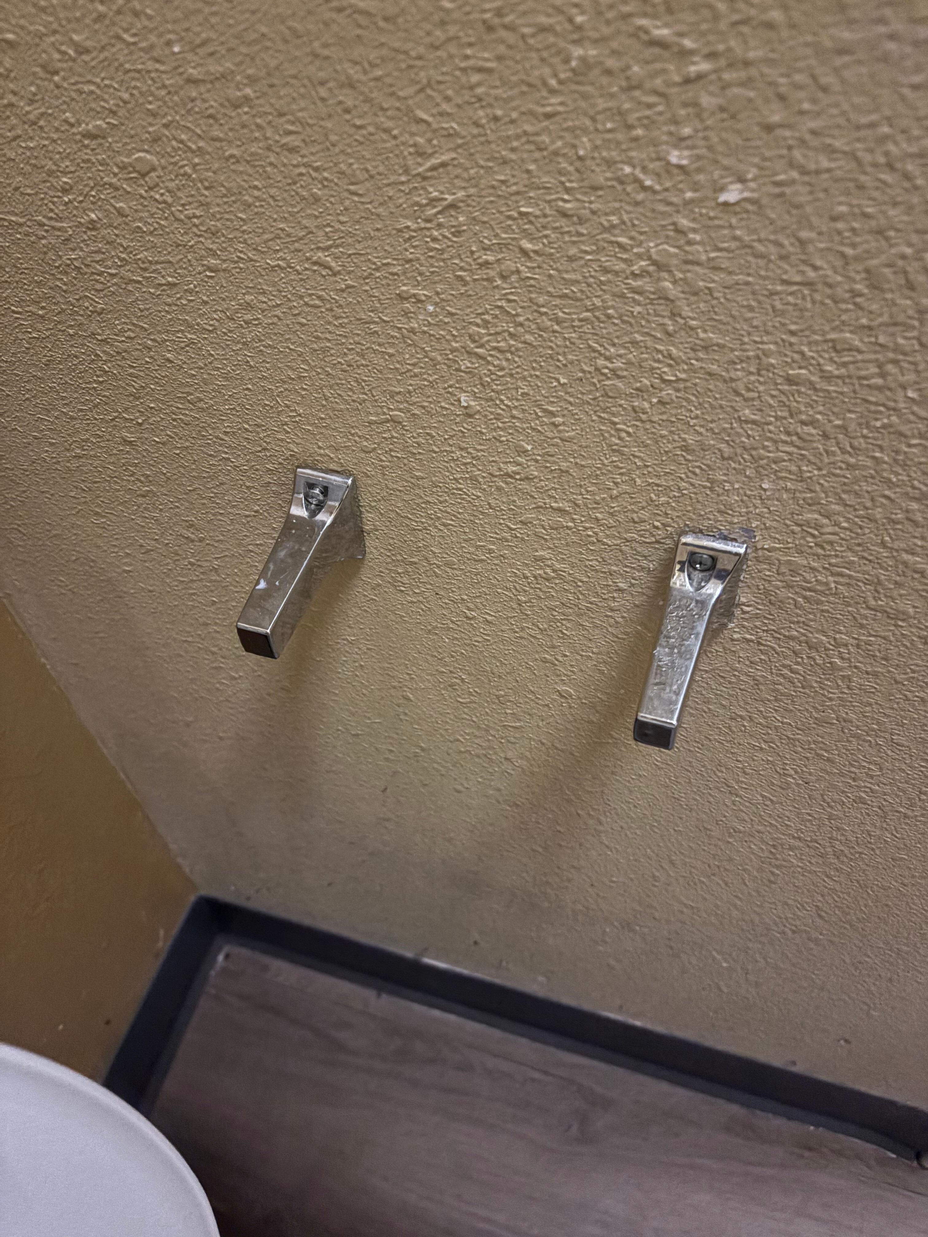 Broken toilet paper holder in “upgraded” room