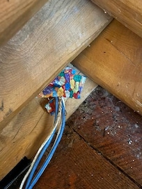 Behind the TV in Family Room.