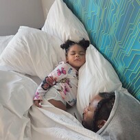 My son and granddaughter... I think they enjoyed the bed. It's after 3 pm. Lol