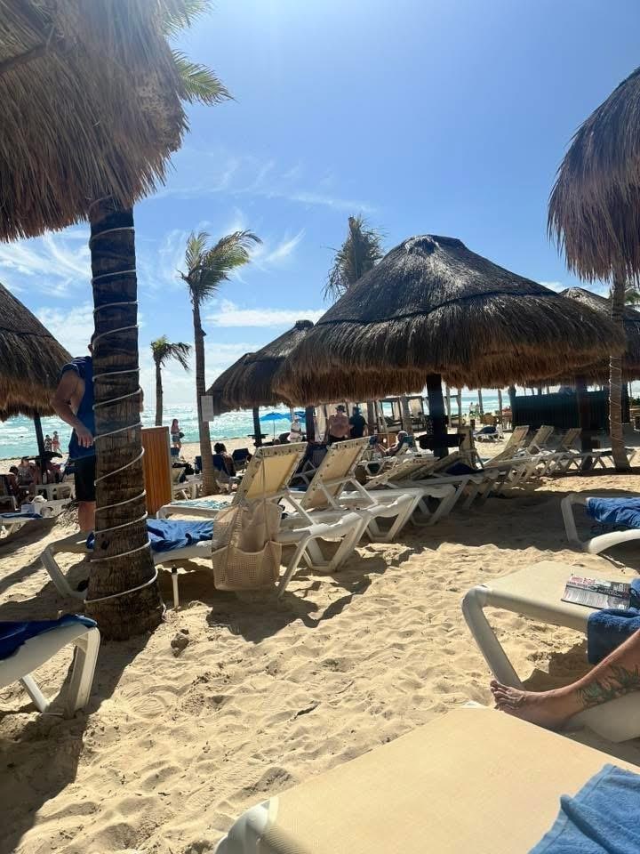 Beach loungers - staff brings you drinks and food. Tip each time you get something.