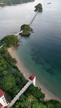 Beach is so picturesque, shame the bridge is just leading to abandoned buildings.