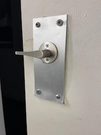 This bathroom door looked like someone broke in.