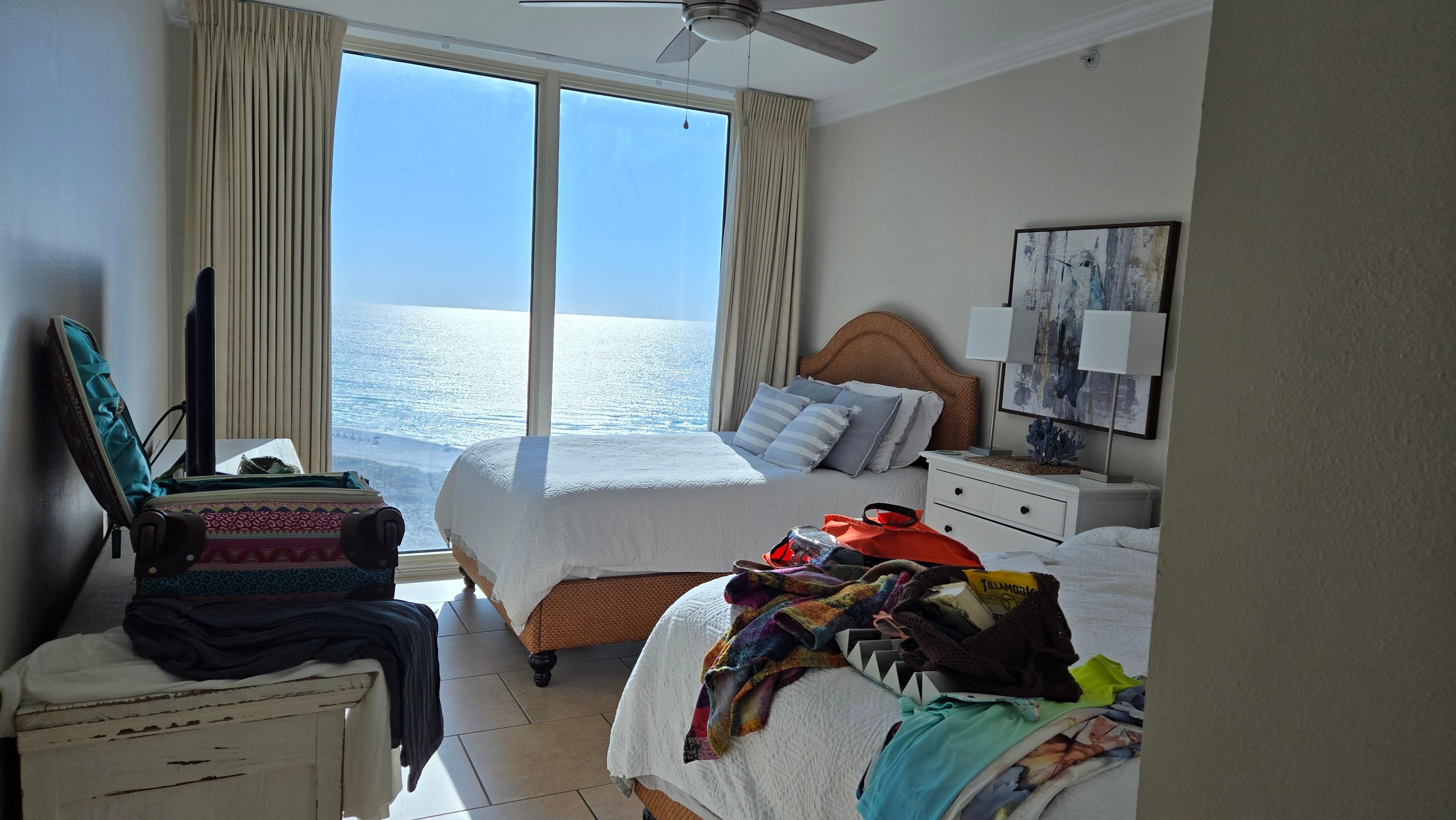 Two of the bedrooms + the main living area have direct access to the balcony, the double bedroom only has floor ro ceiling windows, no access to balcony.