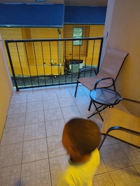 My son checking out the balcony