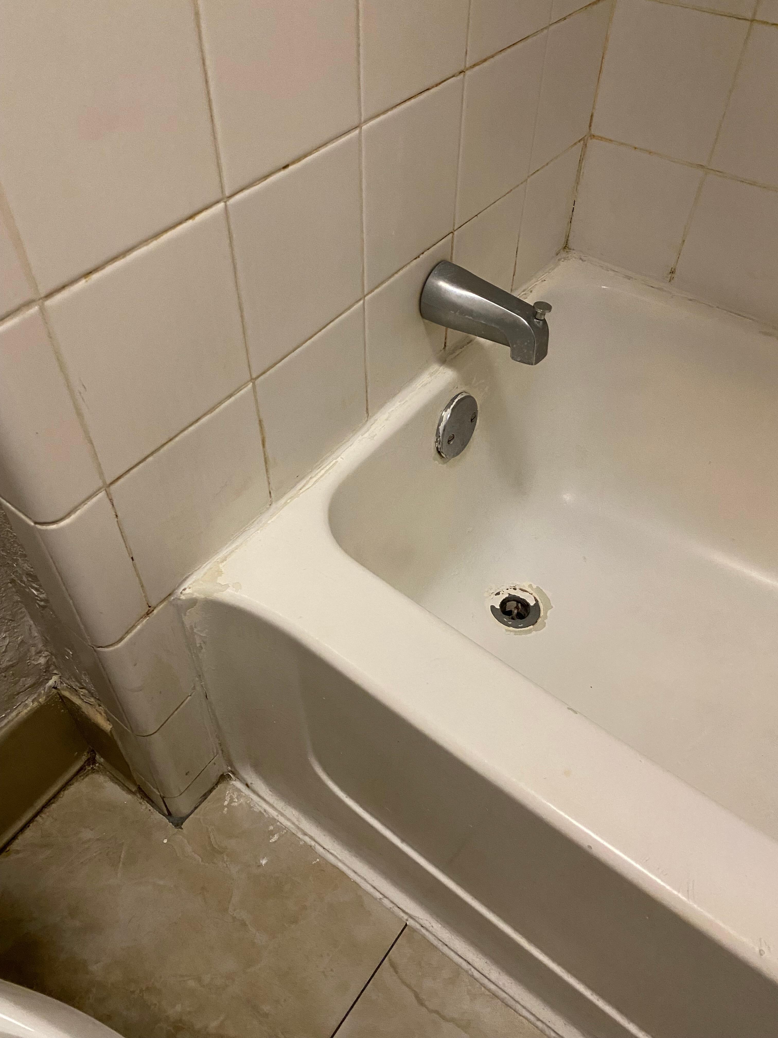 Dirty grout and plenty of mold. 