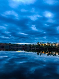 A night of relaxing on the dock. The water was so flat it mirrored the sky.