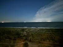 Full moon over the bay.