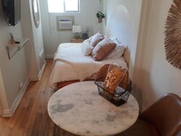 Cozy sleeping nook. Superb mattress and bedding.