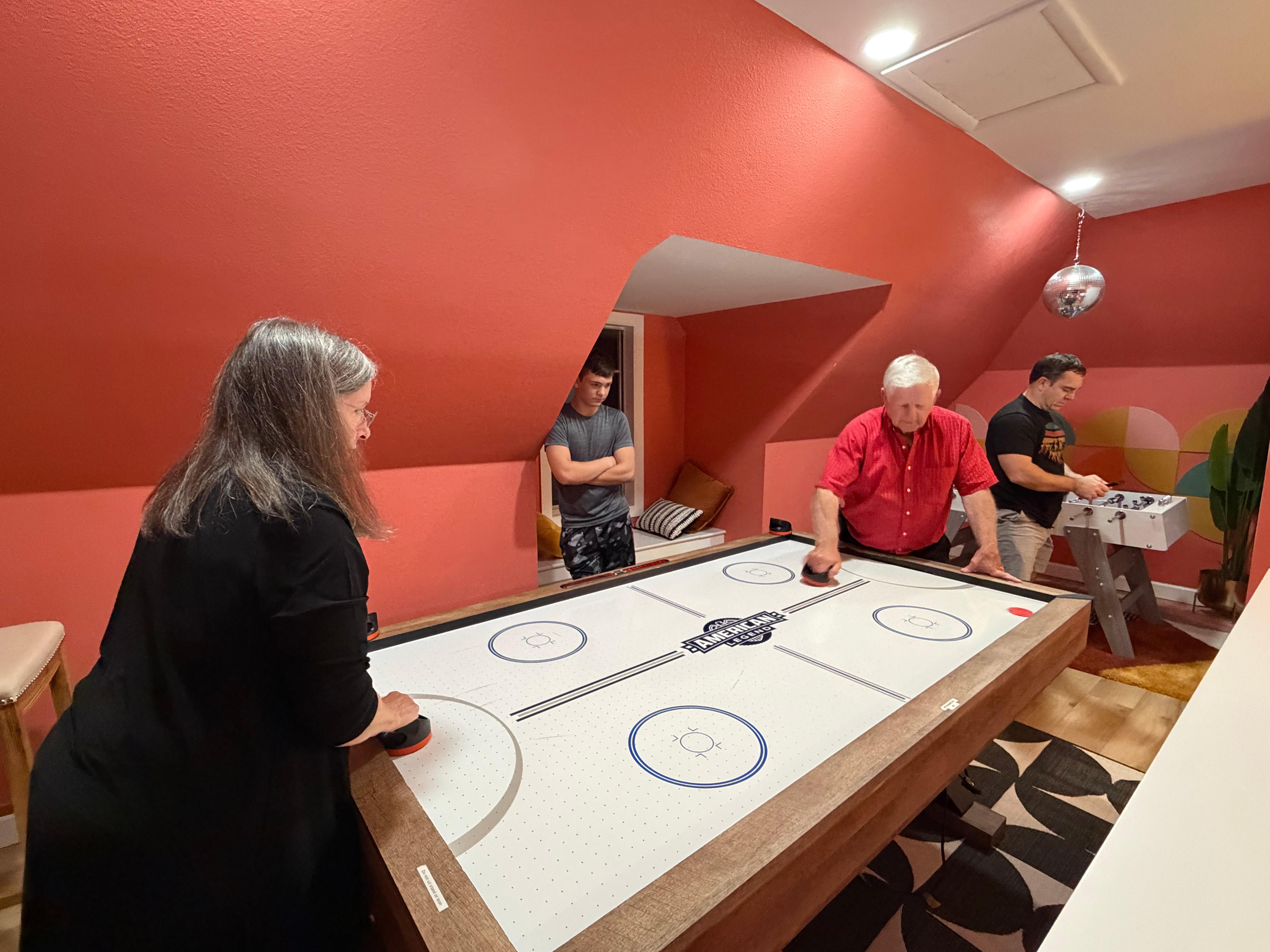 Air hockey with the grandparents!