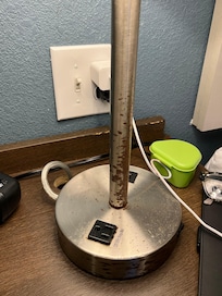 Chrome lamp is rusted.