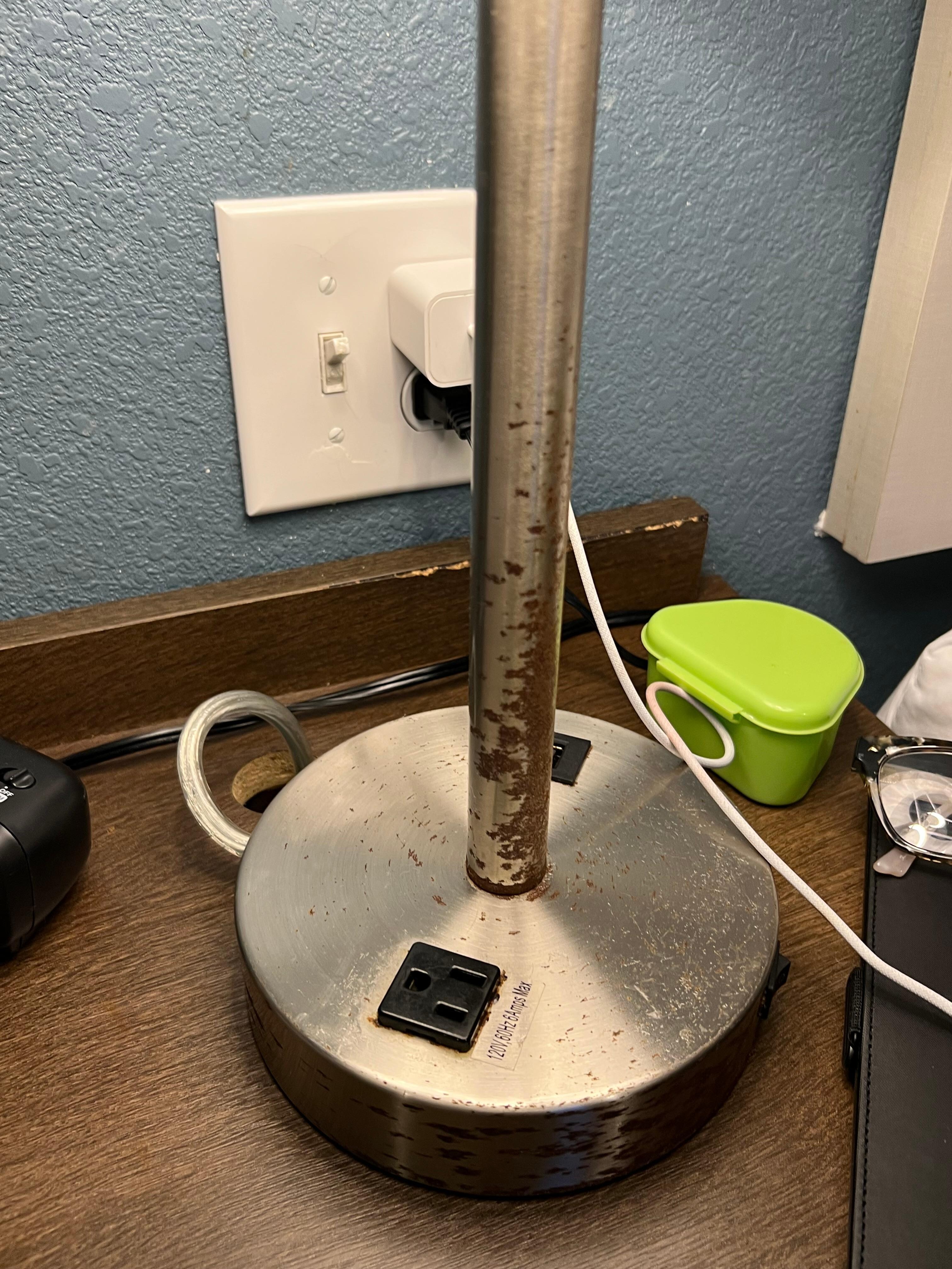 Chrome lamp is rusted.