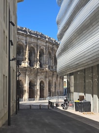 Odalys on the left, La Musee de la Romanite on the right, Les Arènes de Nîmes centre. Convenient!