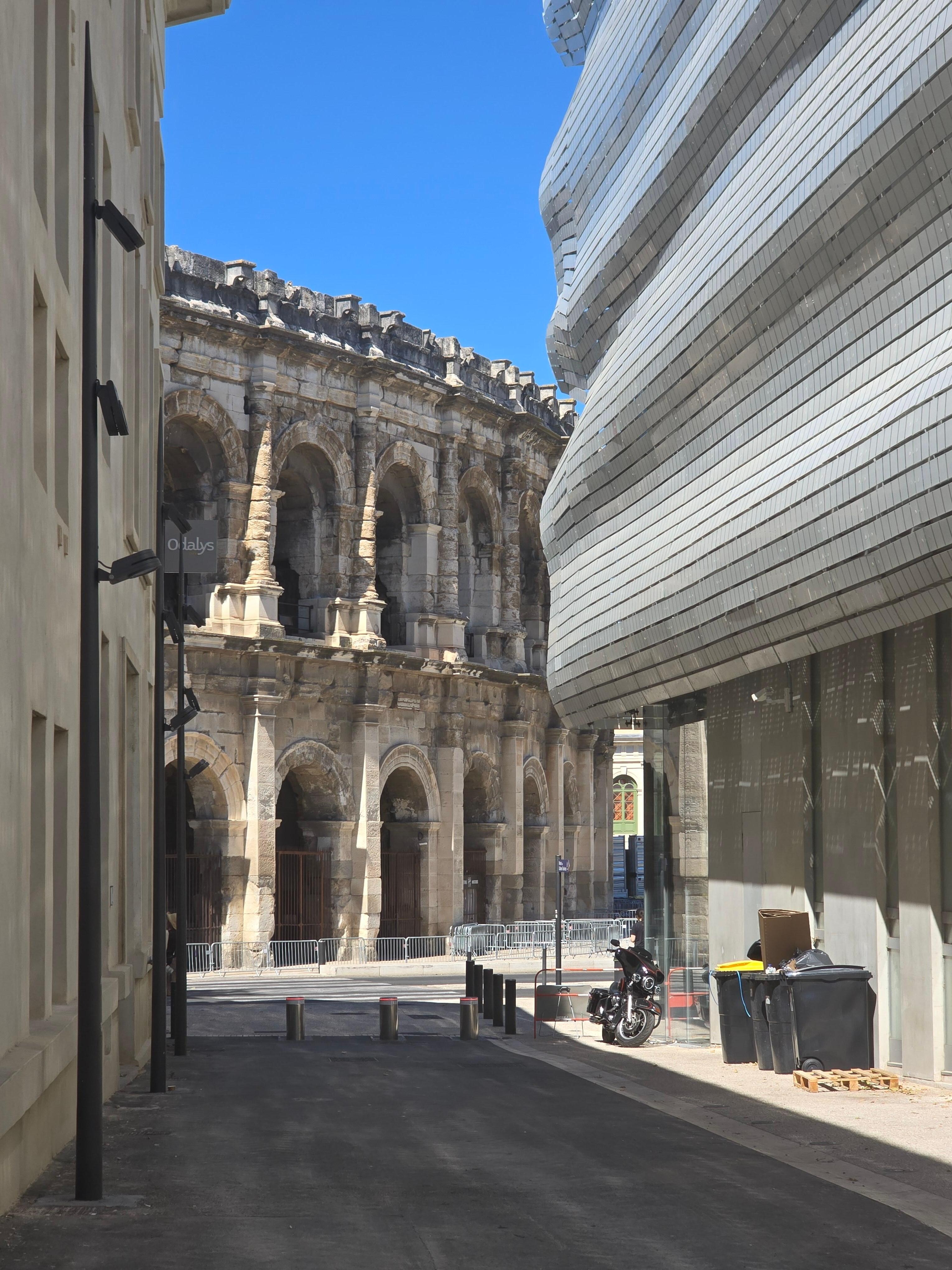 Odalys on the left, La Musee de la Romanite on the right, Les Arènes de Nîmes centre.  Convenient!