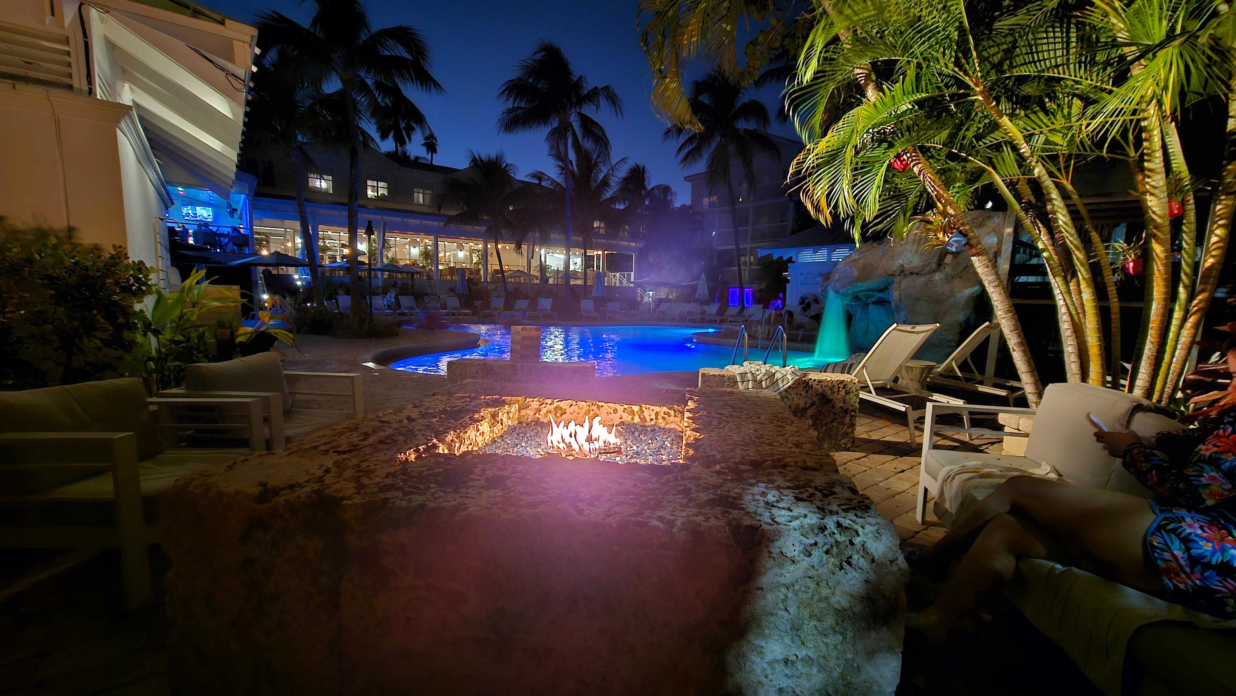 The pool area after dark, we were sitting by the fire table