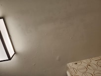 Bubbled paint on Bathroom ceiling