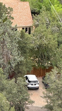 Zoomed in with phone and can see the house