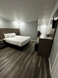 The false ‘bedroom’ from the entrance to the outside.  Not an actual bedroom - no door = no privacy.  You can see kitchen area in back.