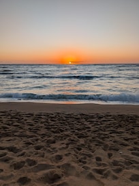 beautiful sunrise on the beach at the resort