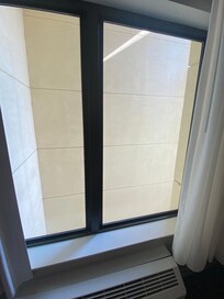 Corner rooms have no view, just a wall