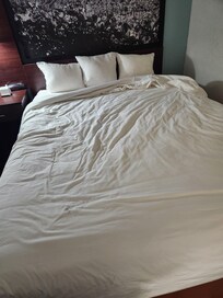 Unmade bed.