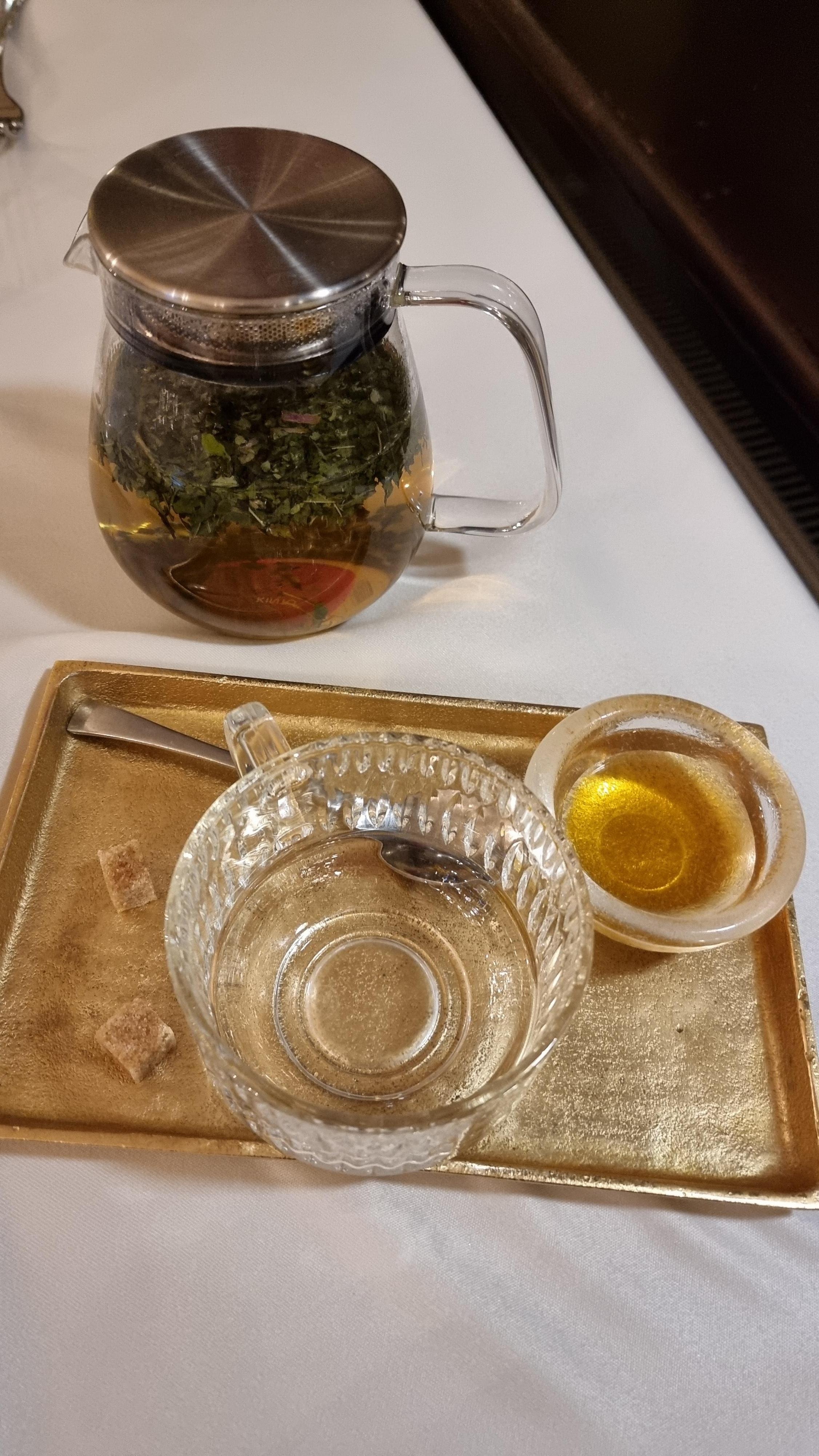 Peppermint tea in the restaurant with honey 