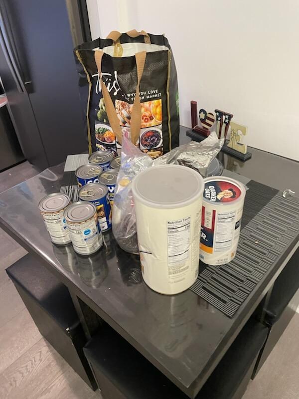 Dirty table with random food on it 