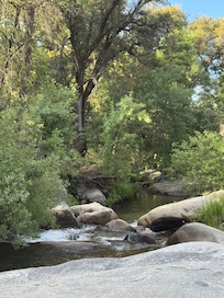 Beautiful creek just down the hill, steep steps, but so worth it!