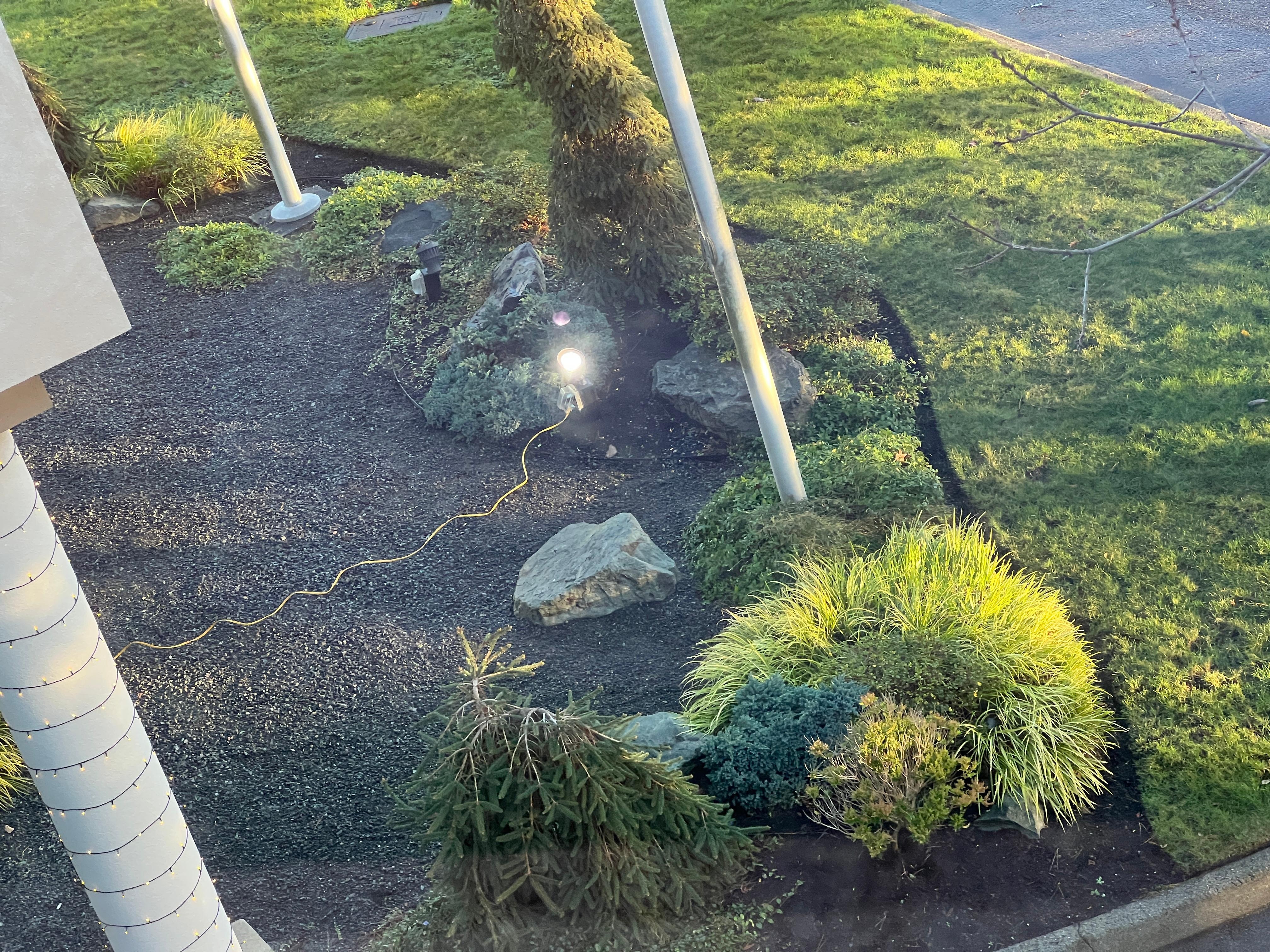 Light shining directly onto to our room to illuminate flags which are left out at night to make a lot of noise when windy.