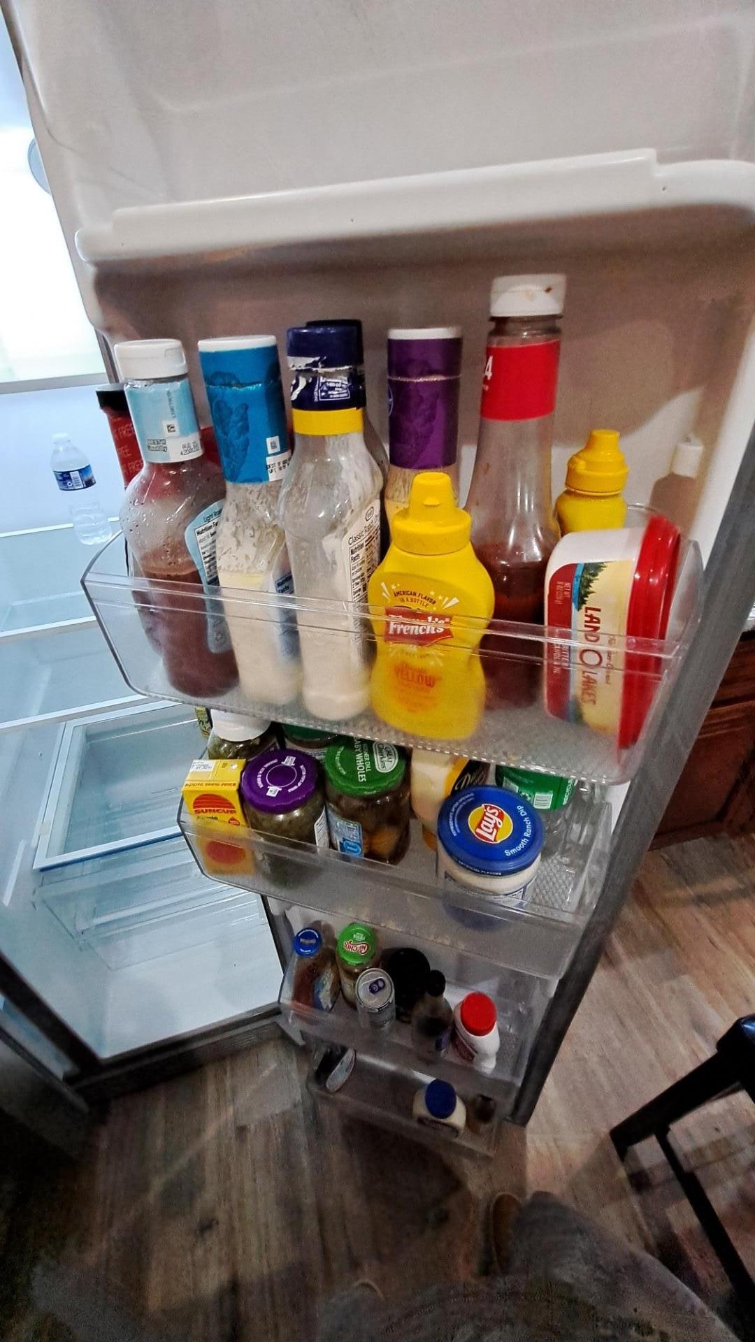 The Refrigerator as we Found It. I wouldn't buy these products in the grocery store unsealed, so why would I want these,