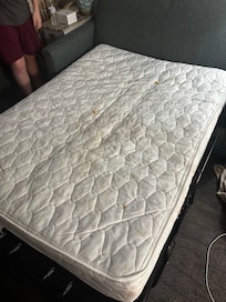 Stained mattress comes with free Cheetos.