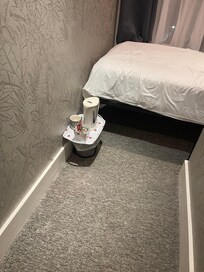 Tea Tray on bin, no table or chair in room