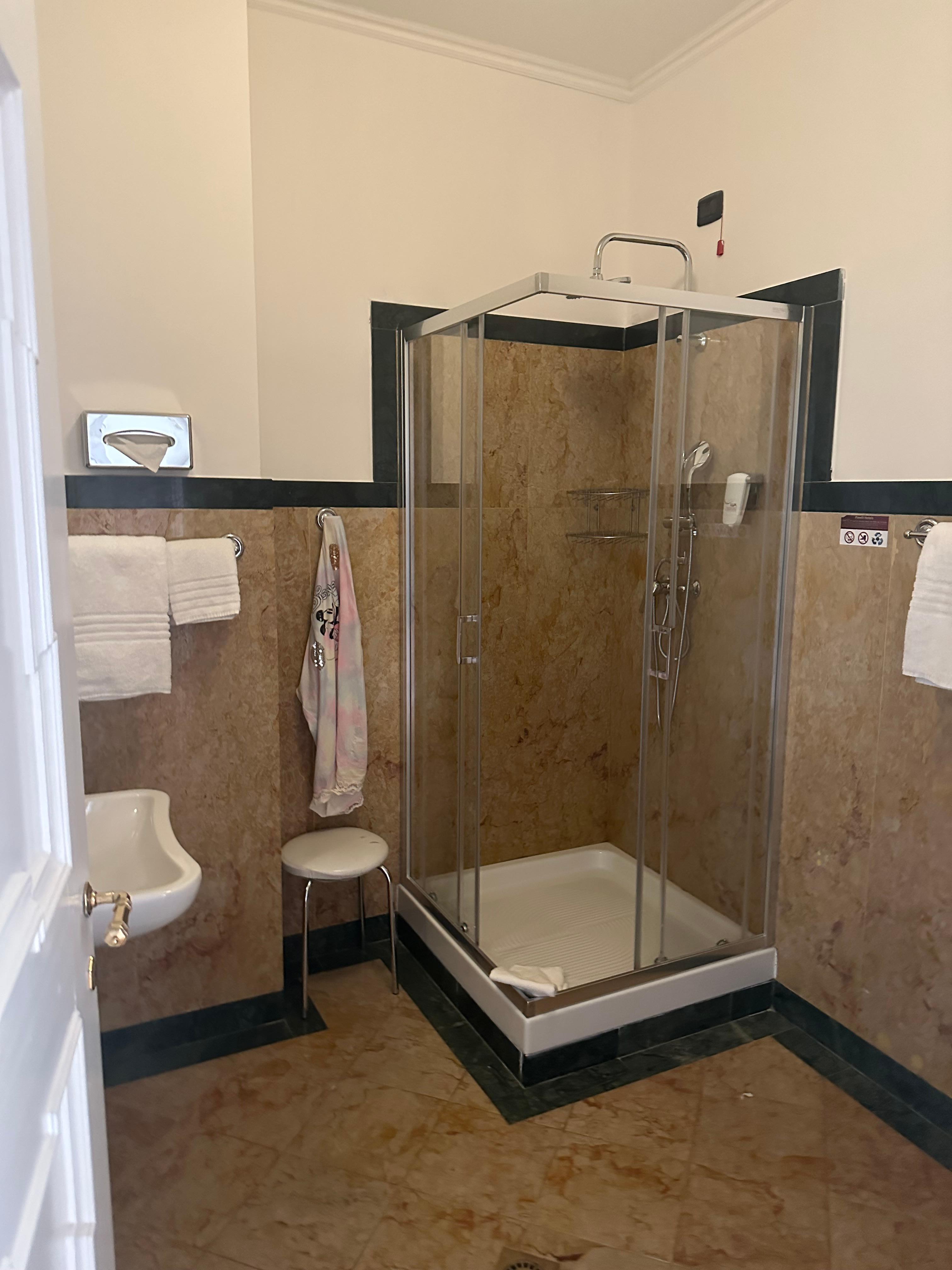 Spacious, and loved the high toilet seat.