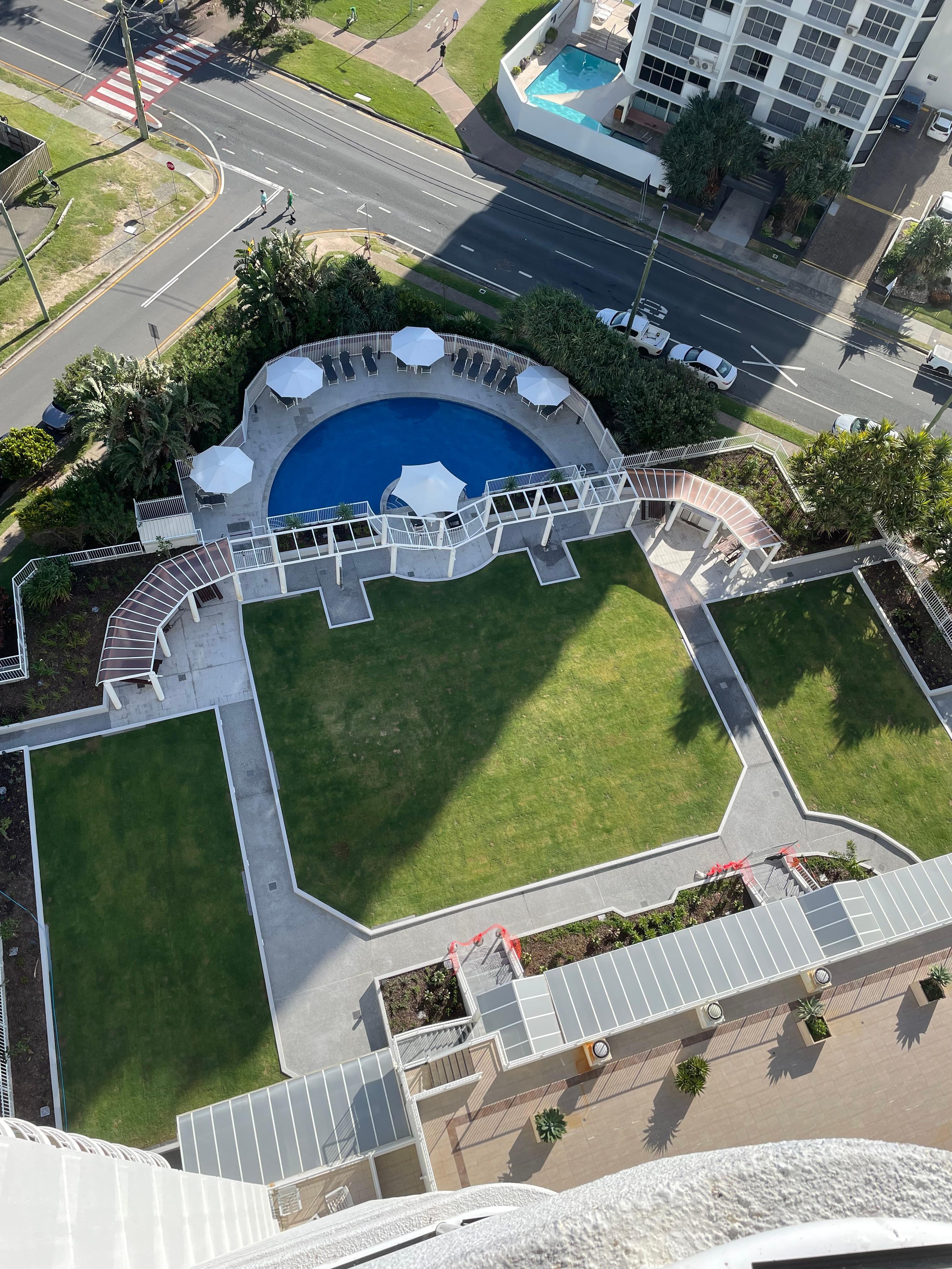 View of garden and pool from our apartment balcony ❤️